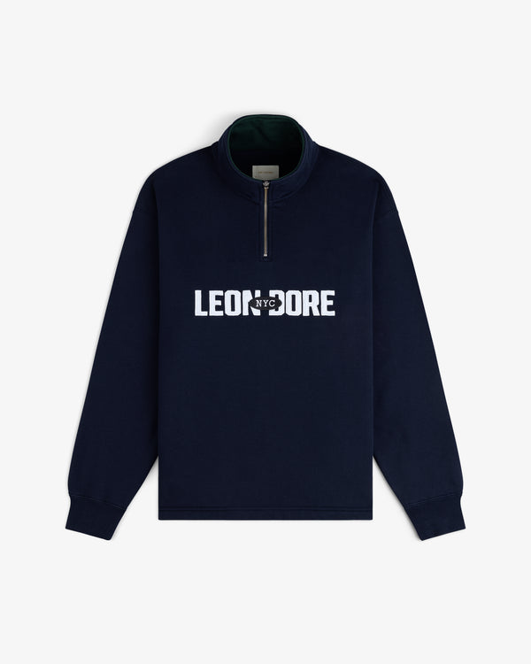 Aimé Souvenir Quarter Zip in navy with white LEON DORE NYC text, displayed flat on a white background.