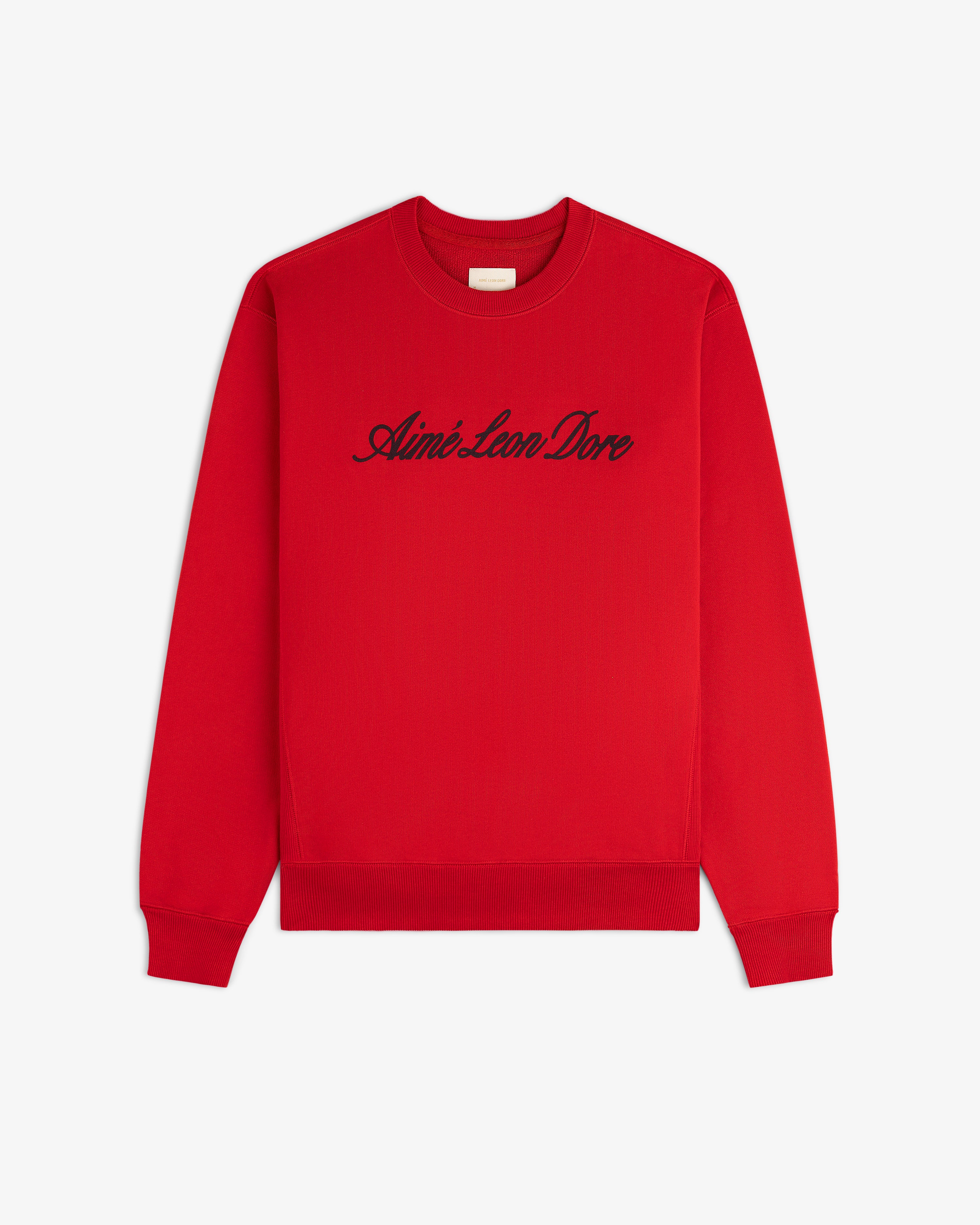 Vintage Script Crewneck Sweatshirt in red with black Aimé Leon Dore script, shown on a white background.