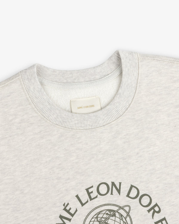 Light grey Atlas Crewneck Sweatshirt with a ribbed collar and a graphic print on the chest.