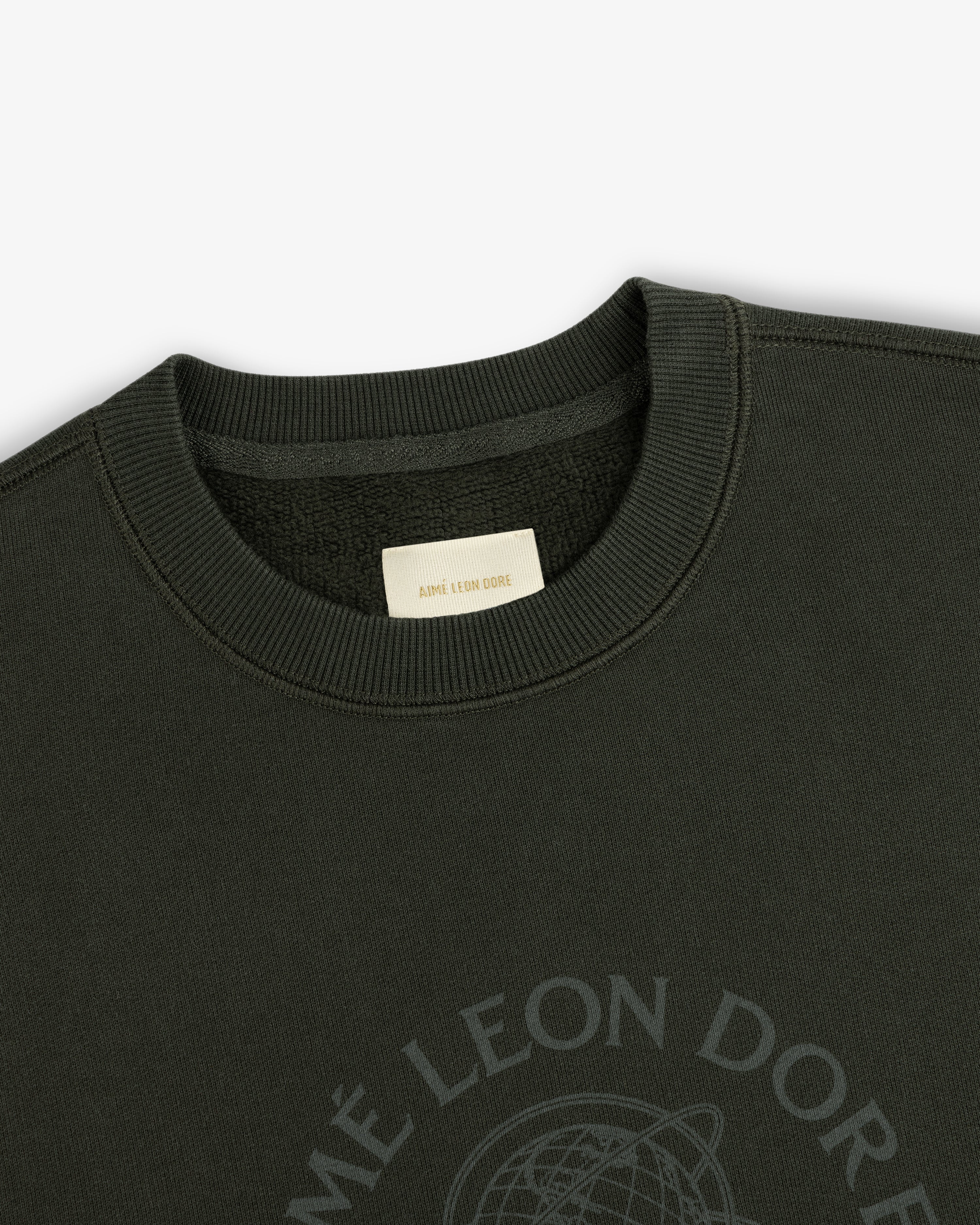 Dark green Atlas Crewneck Sweatshirt with a rib-knit collar, interior brand label, and chest globe graphic.
