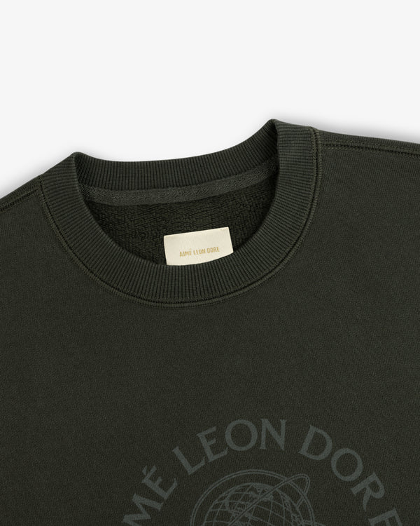 Dark green Atlas Crewneck Sweatshirt with a rib-knit collar, interior brand label, and chest globe graphic.