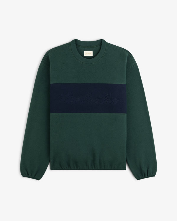Fleece Script Paneled Crewneck Sweatshirt in dark green with a navy horizontal chest panel featuring embroidered lettering.