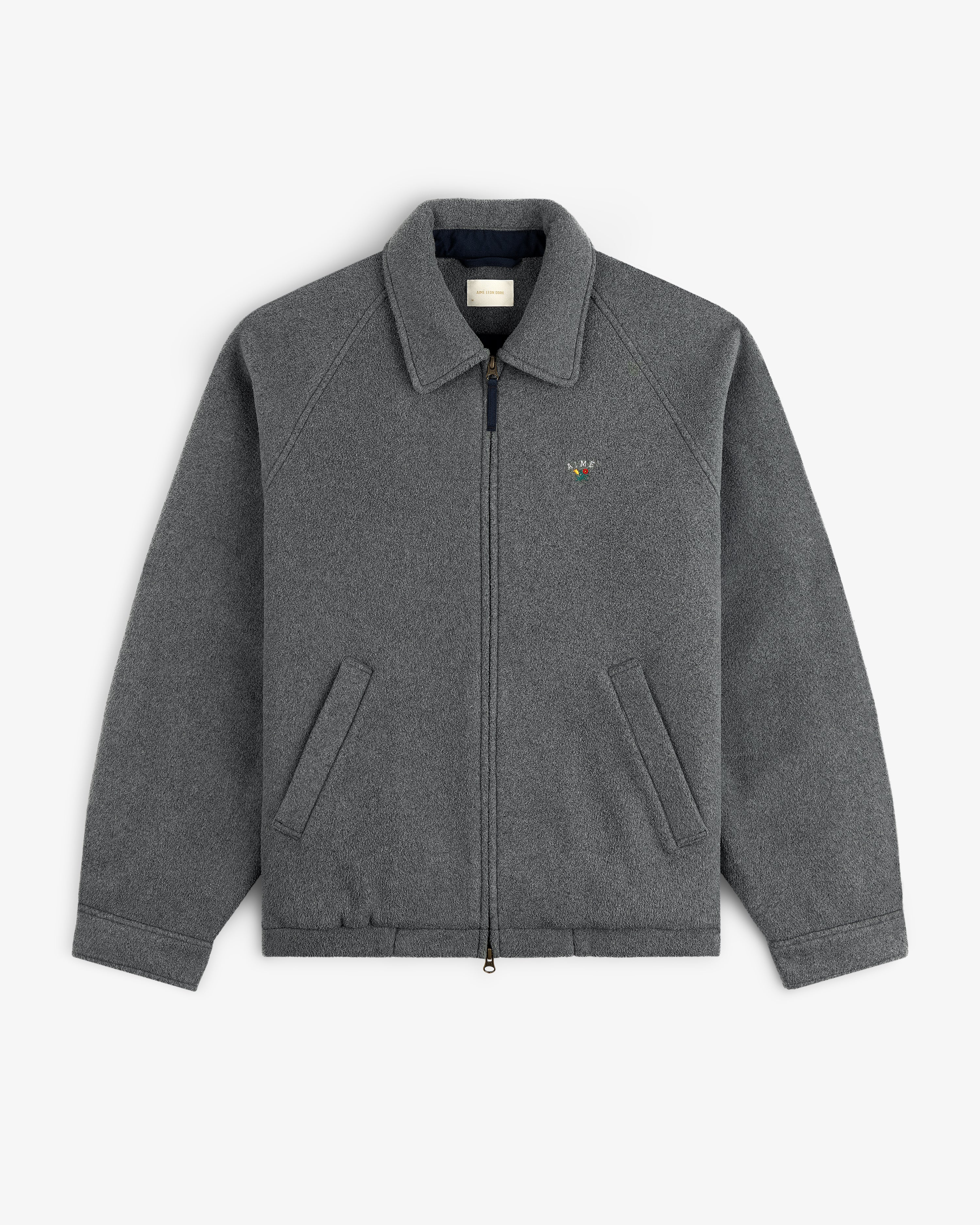 Crest Fleece Casual Jacket: gray zip-up with collar, two front pockets, and colorful chest logo.