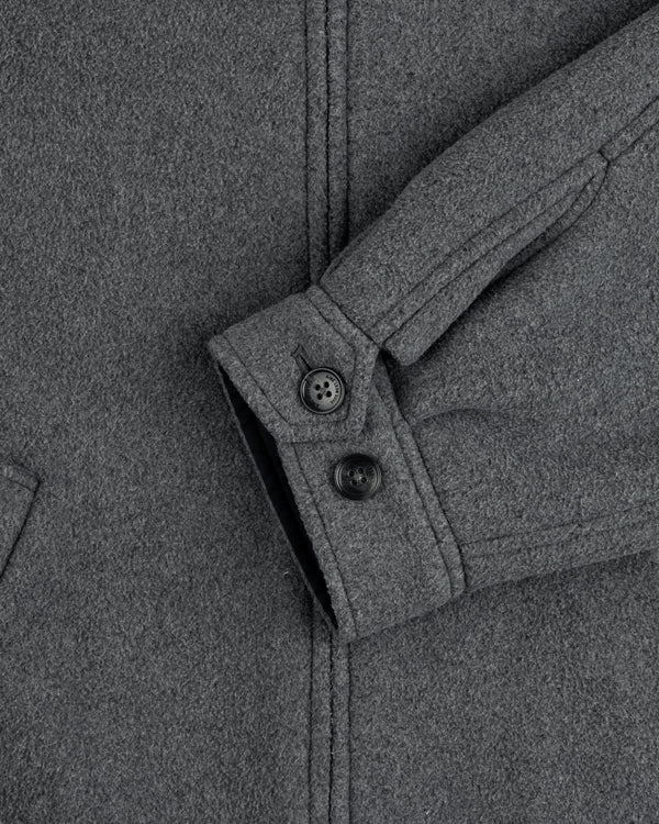 Close-up of Crest Fleece Casual Jacket sleeve in gray, showing two black buttons and a partially visible pocket.