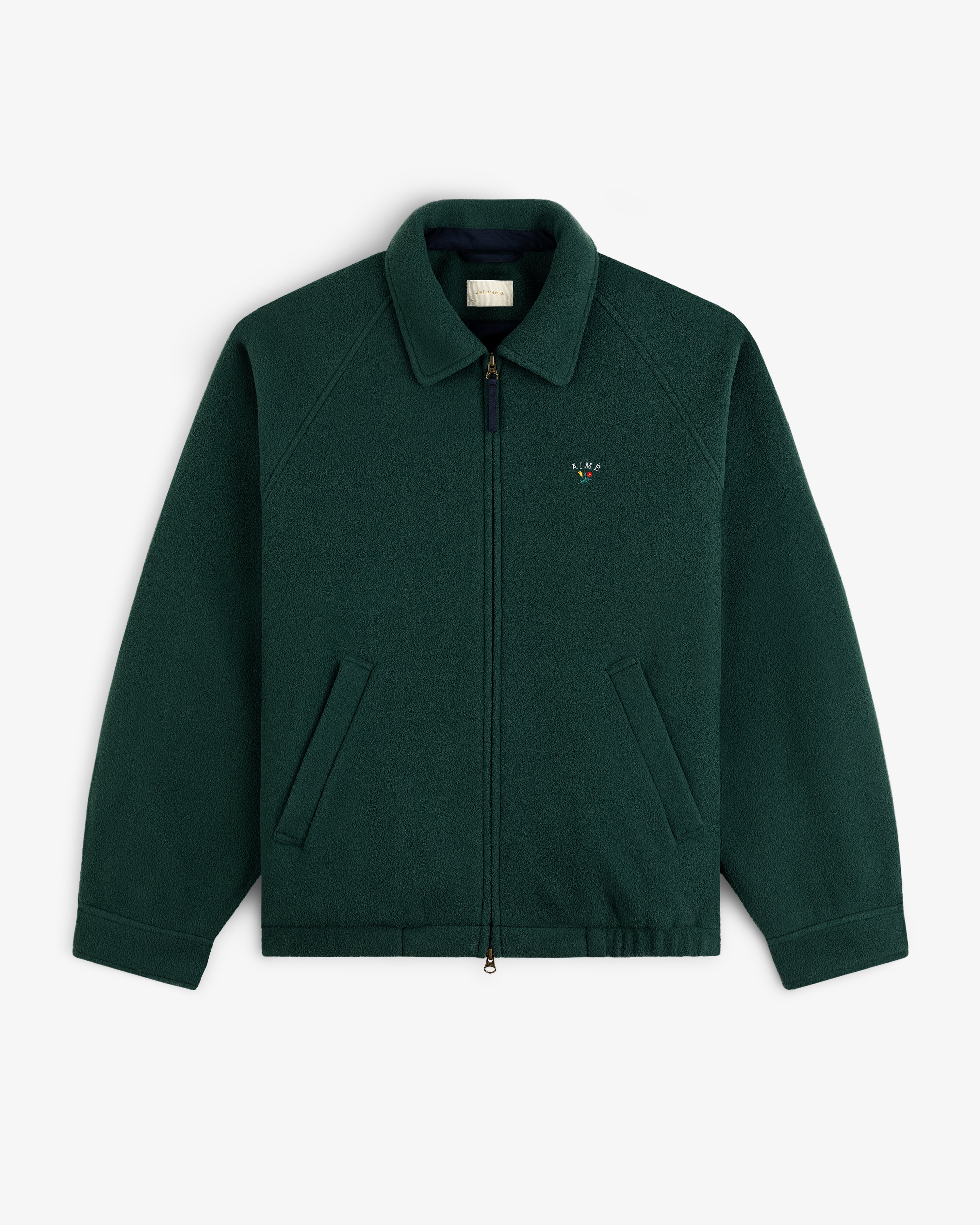 Crest Fleece Casual Jacket—dark green zip-up with collar, 2 pockets, and chest logo embroidery.