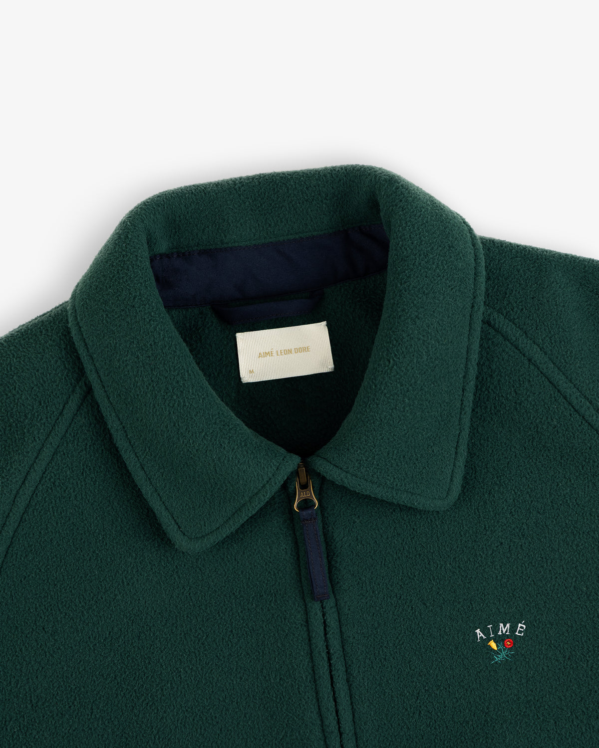 Crest Fleece Casual Jacket in dark green with collar, zipper, and AIMÉ plus red rose embroidered on the chest.