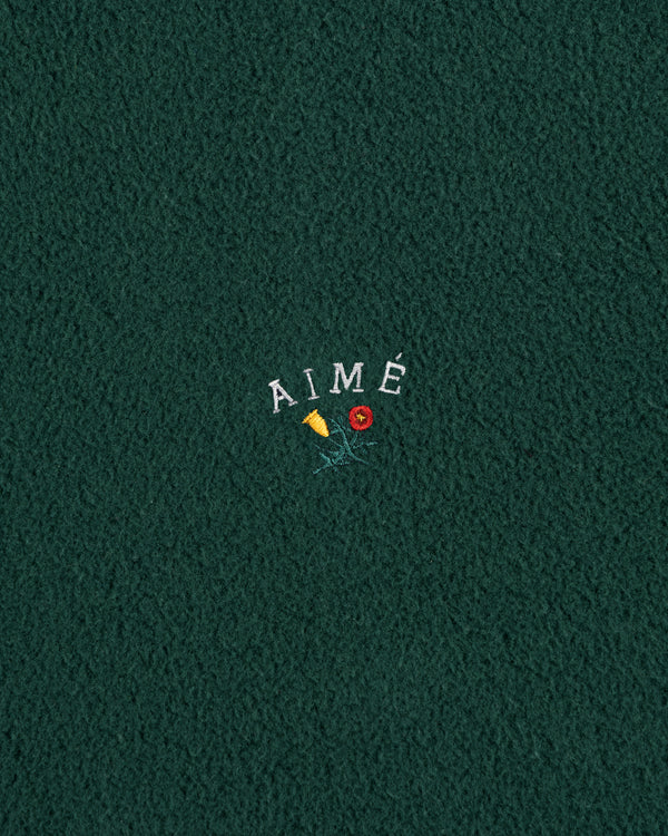 Green fleece Crest Fleece Casual Jacket with AIMÉ text embroidered above a yellow flower and red rose.