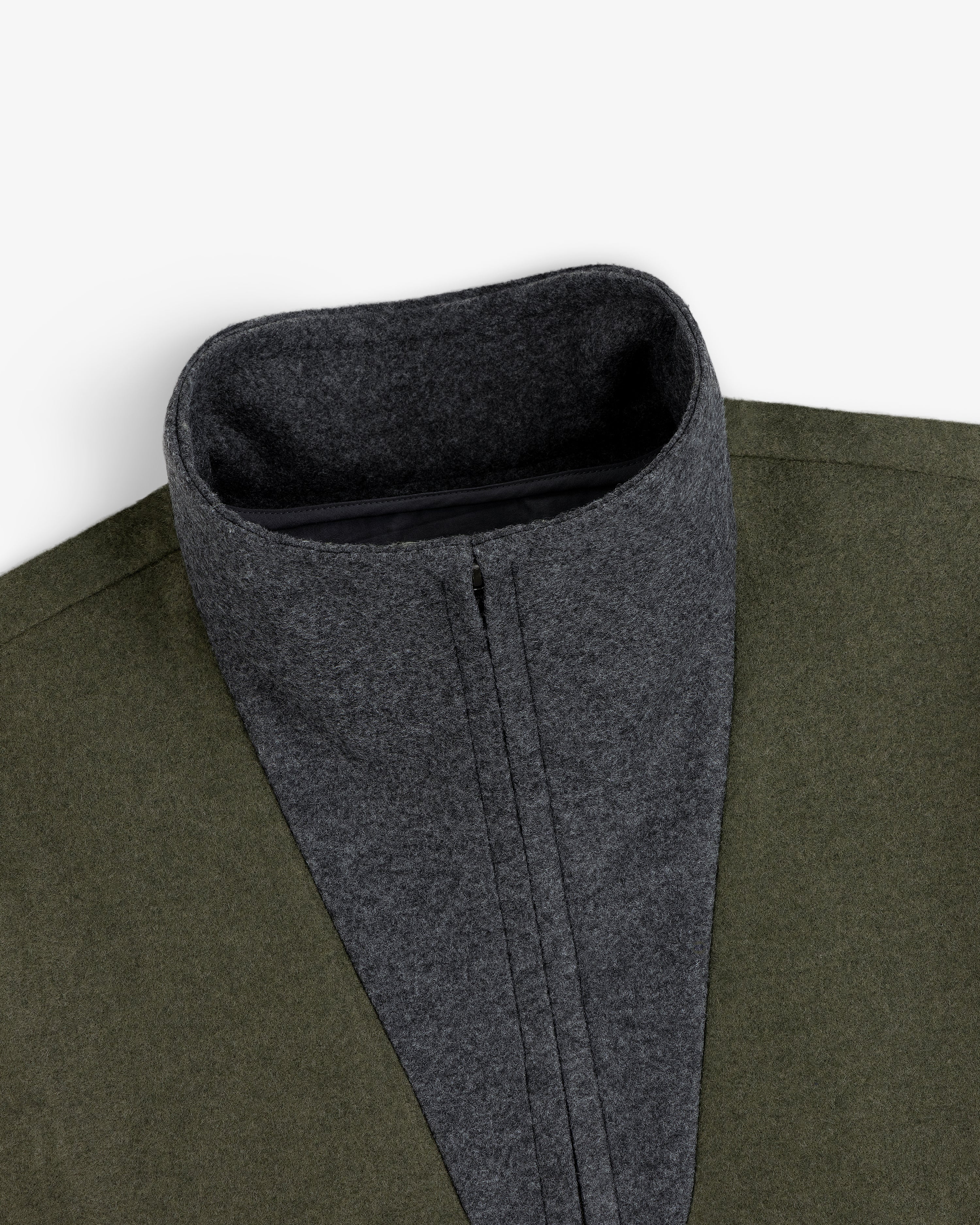 Surplus Fleece Quarter Zip Pullover in olive green with a charcoal gray quarter-zip collar.