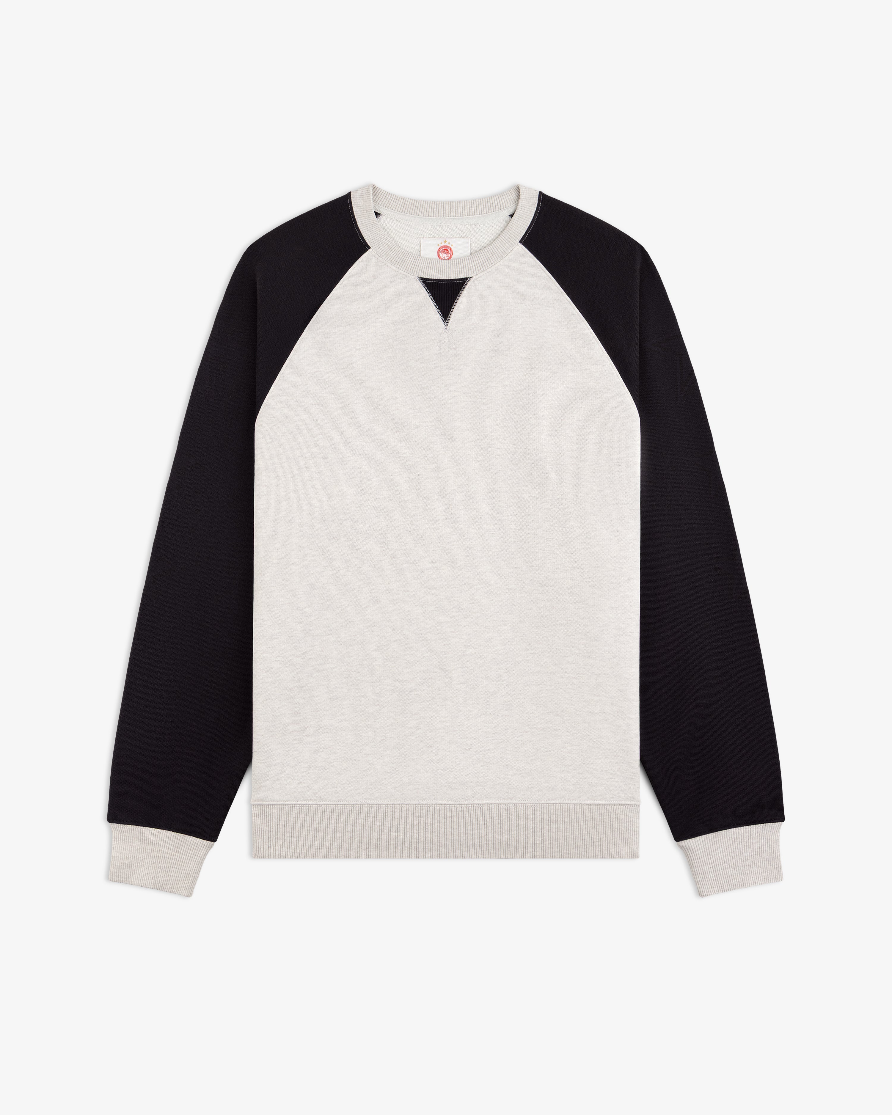 ALD / Olympiacos F.C. Colorblock Crewneck Sweatshirt in light gray with black raglan sleeves and ribbed trim.