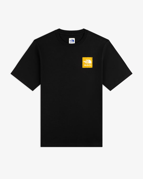 ALD / The North Face Logo Tee: Black short-sleeve tee with a yellow and white square logo on the left chest.
