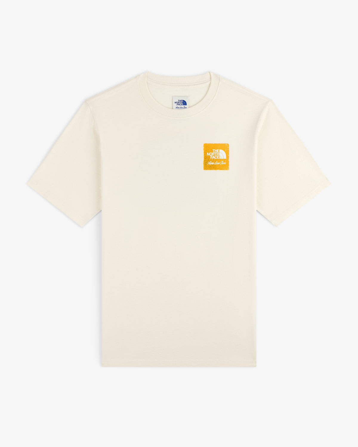 ALD / The North Face Logo Tee in cream with a small yellow logo on left chest, shown flat on a white background.