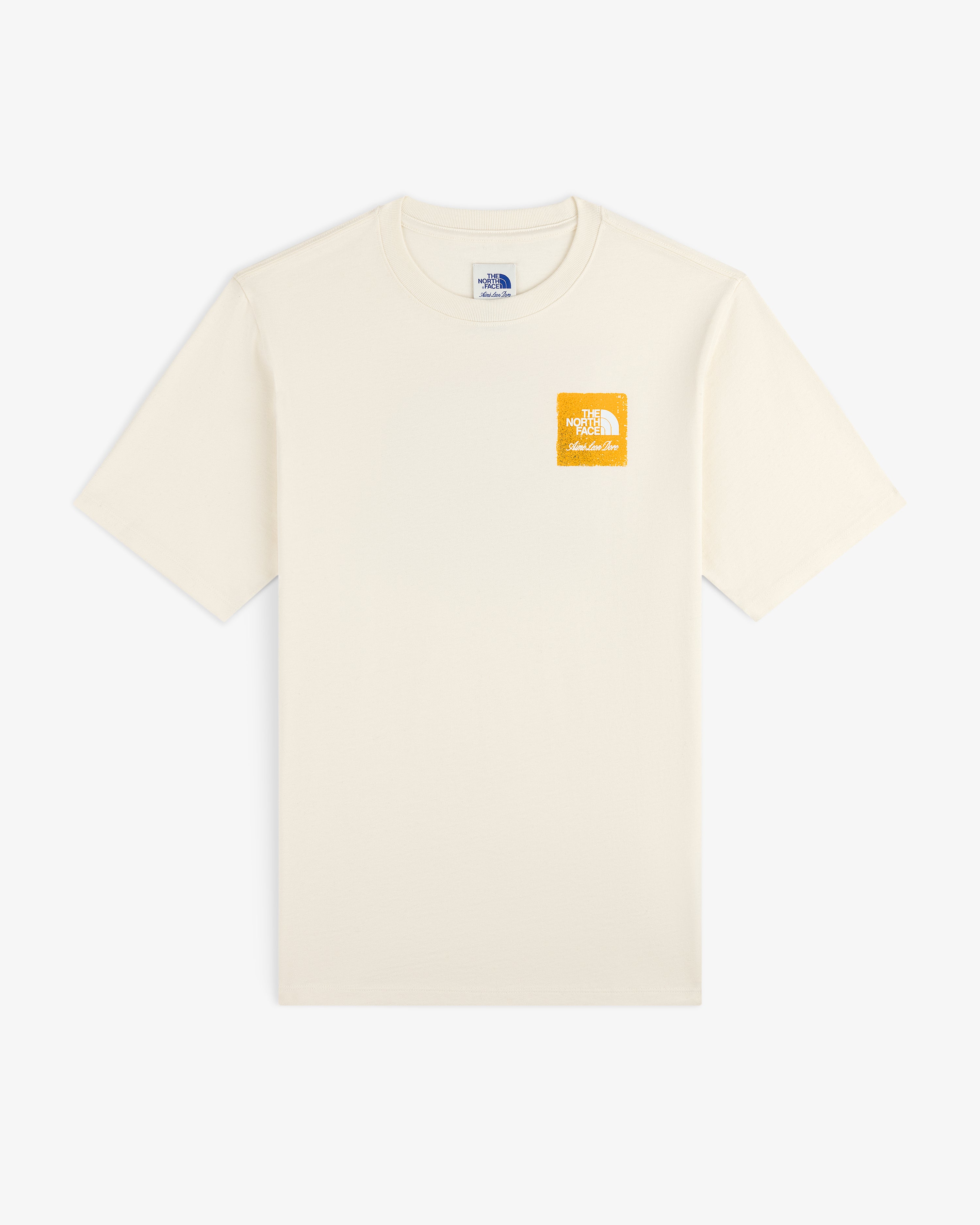 ALD / The North Face Logo Tee in cream with a small yellow logo on left chest, shown flat on a white background.