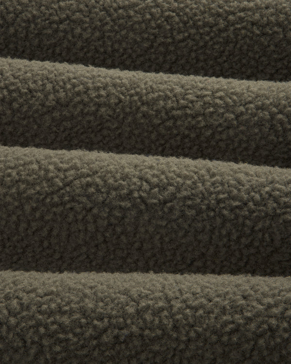 Close-up of ALD/The North Face Fleece Rugby in dark brown, highlighting its soft, textured, and cozy fabric.