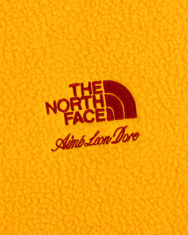 ALD / The North Face Fleece Rugby with red stitched logos on yellow fleece fabric.