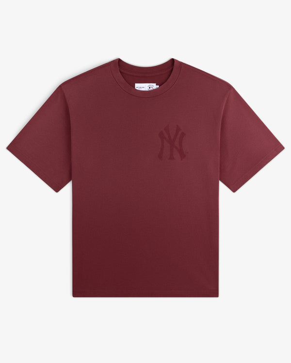 Yankees Washed Logo Tee: maroon short sleeve with a subtle Yankees logo on the left chest.