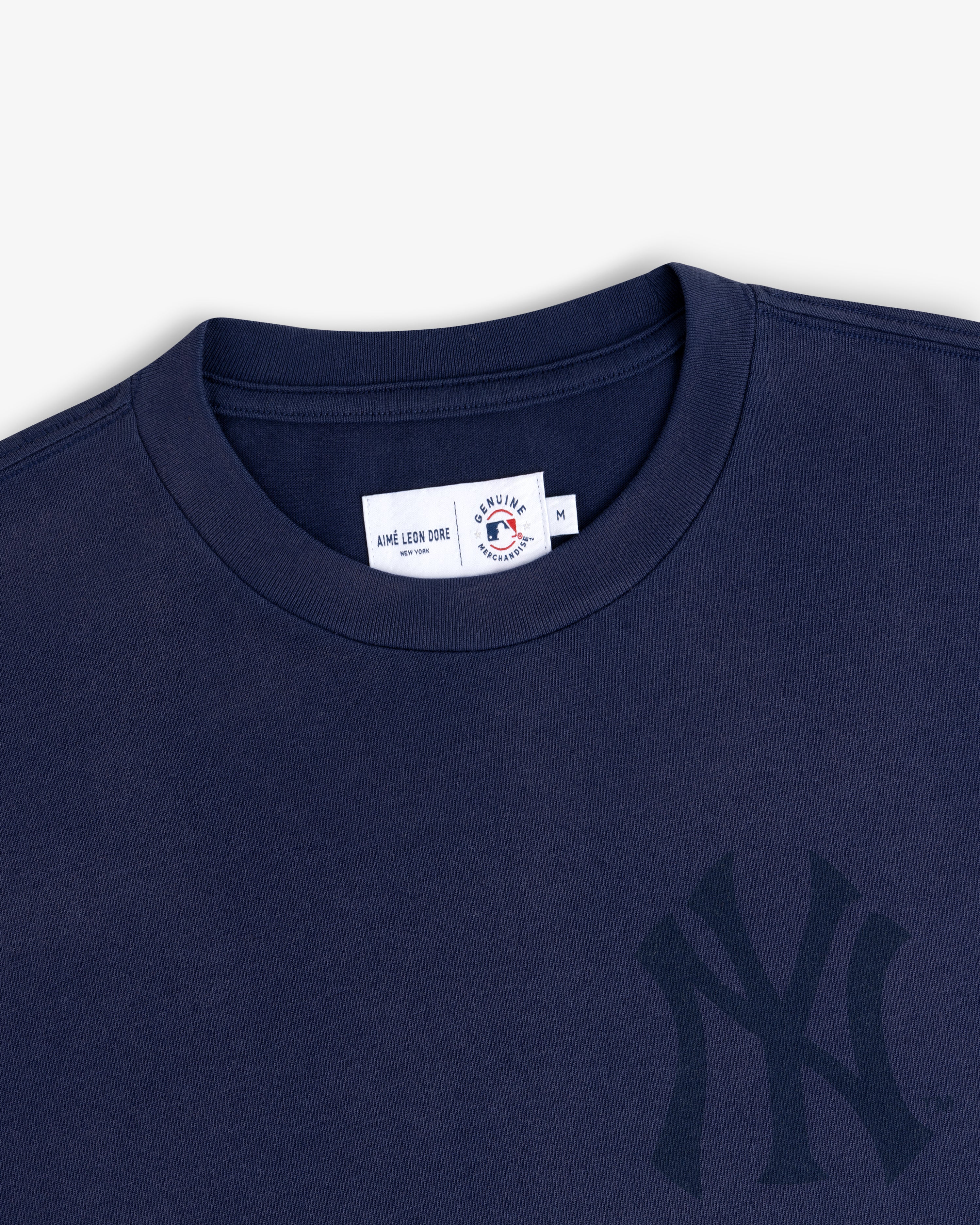 Yankees Washed Logo Tee in navy with New York Yankees logo and Aimé Leon Dore tag at the collar.