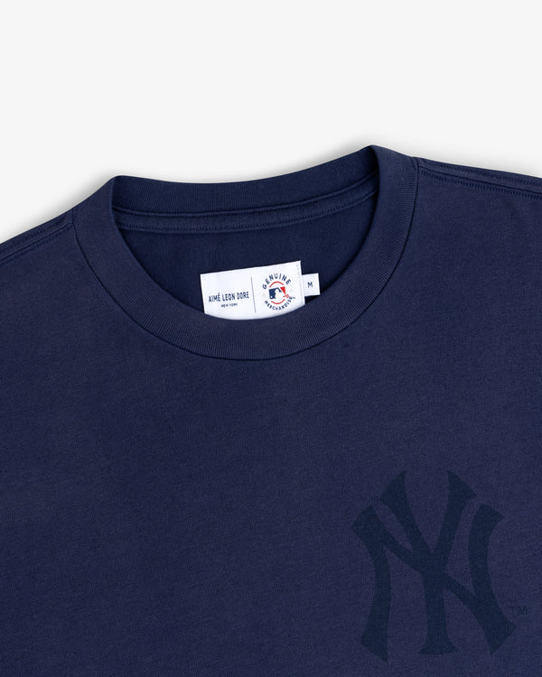 Yankees Washed Logo Tee in navy with New York Yankees logo and Aimé Leon Dore tag at the collar.