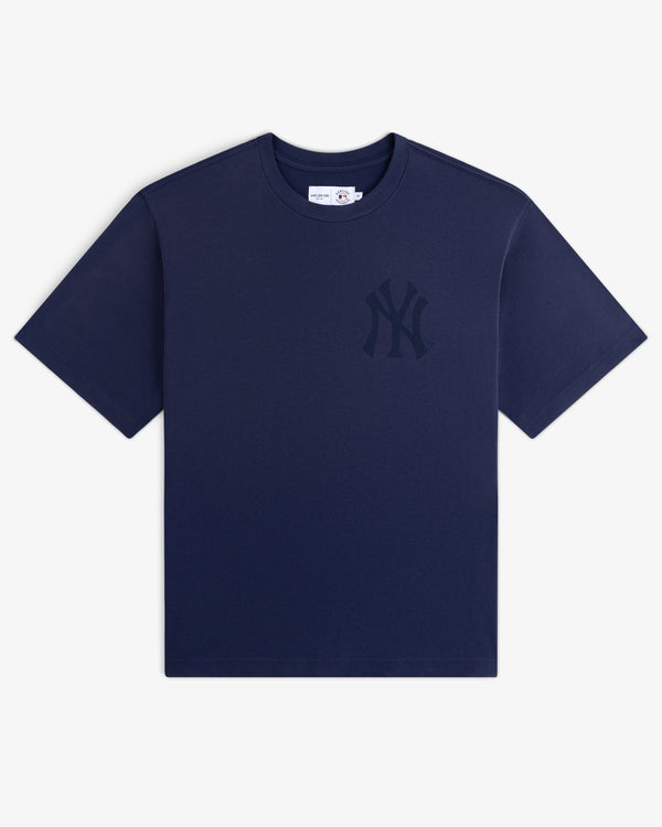 Yankees Washed Logo Tee in navy with subtle left-chest logo, displayed against a white background.