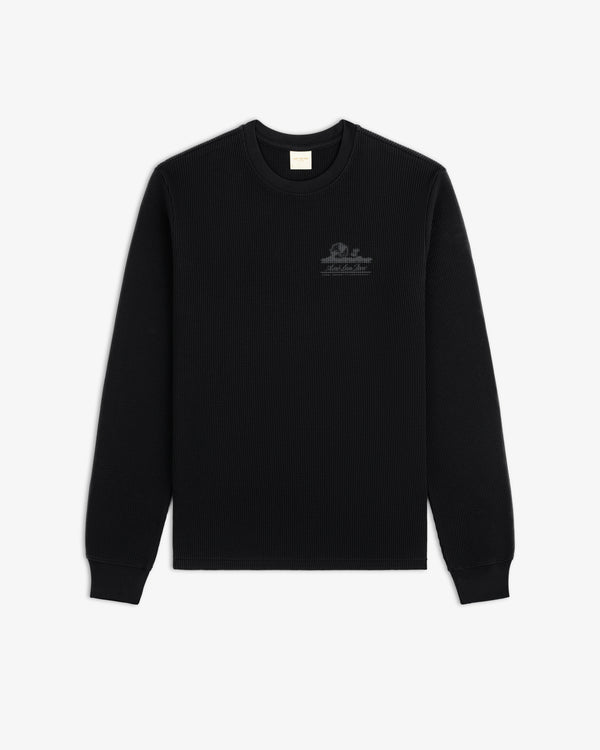 Black Long-Sleeve Unisphere Waffle Thermal with small chest logo, flat on white background.