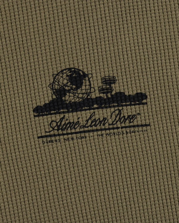 Olive-green waffle thermal with black Unisphere graphic and Ainé Bon Doné script on the front.