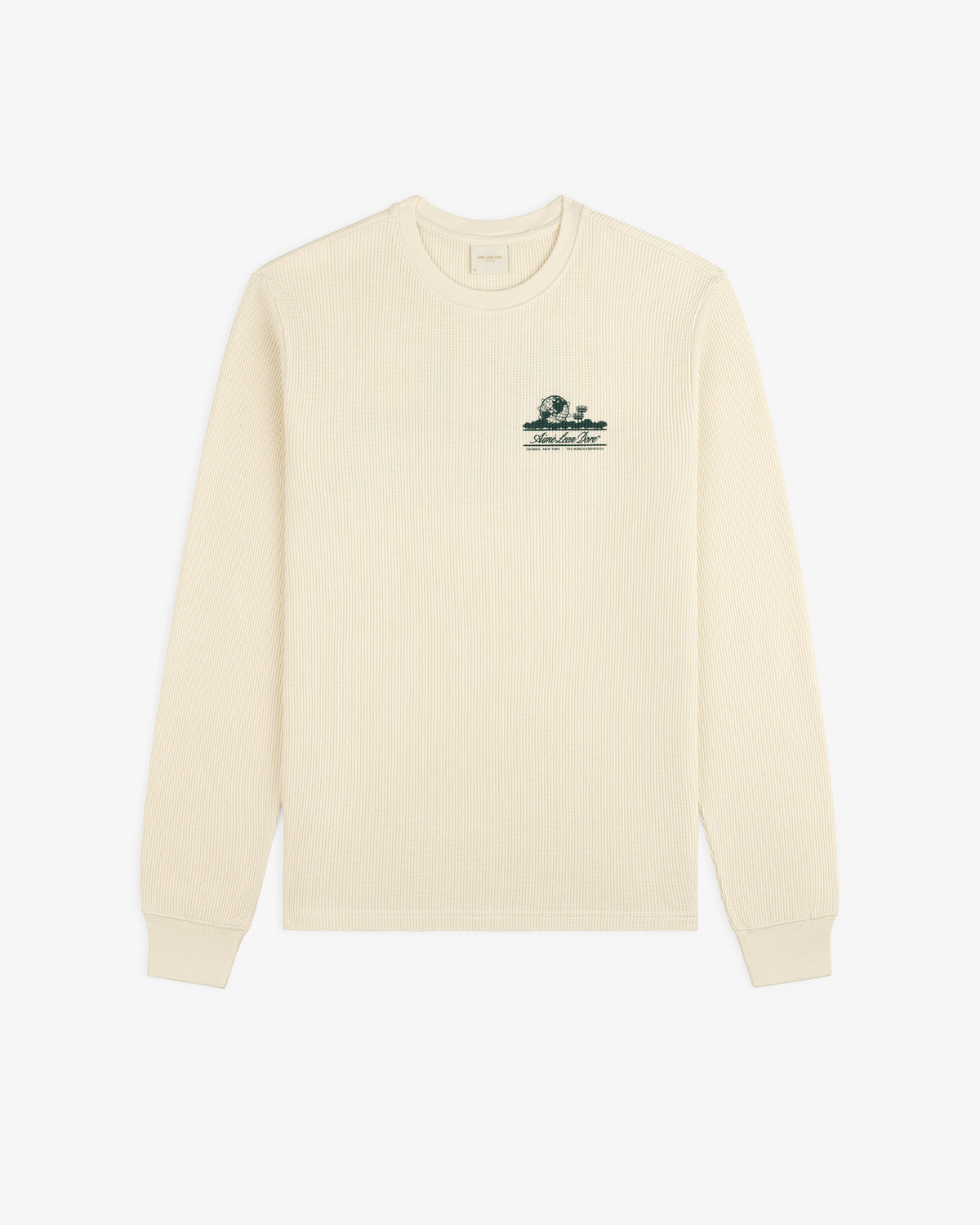 Ivory Long-Sleeve Unisphere Waffle Thermal with a small green embroidered graphic on the upper left chest.