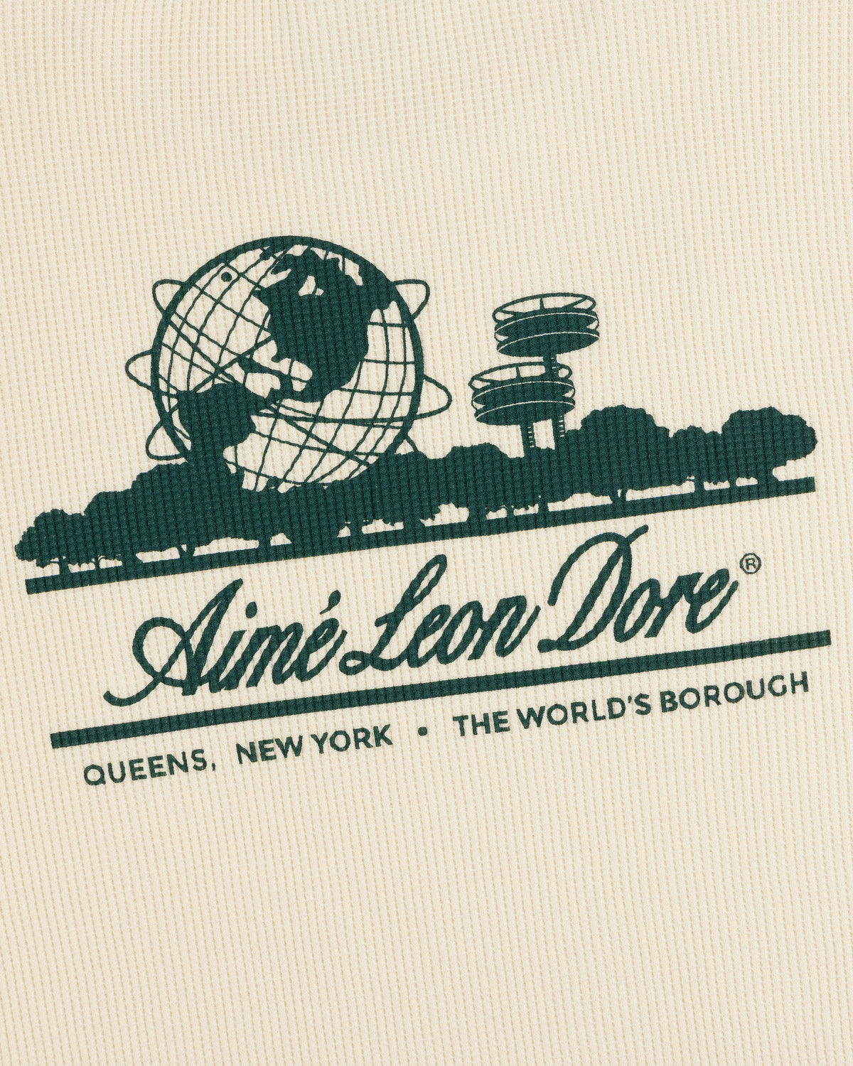 Cream Long-Sleeve Unisphere Waffle Thermal with green illustration and Aimé Leon Dore text featuring location info.