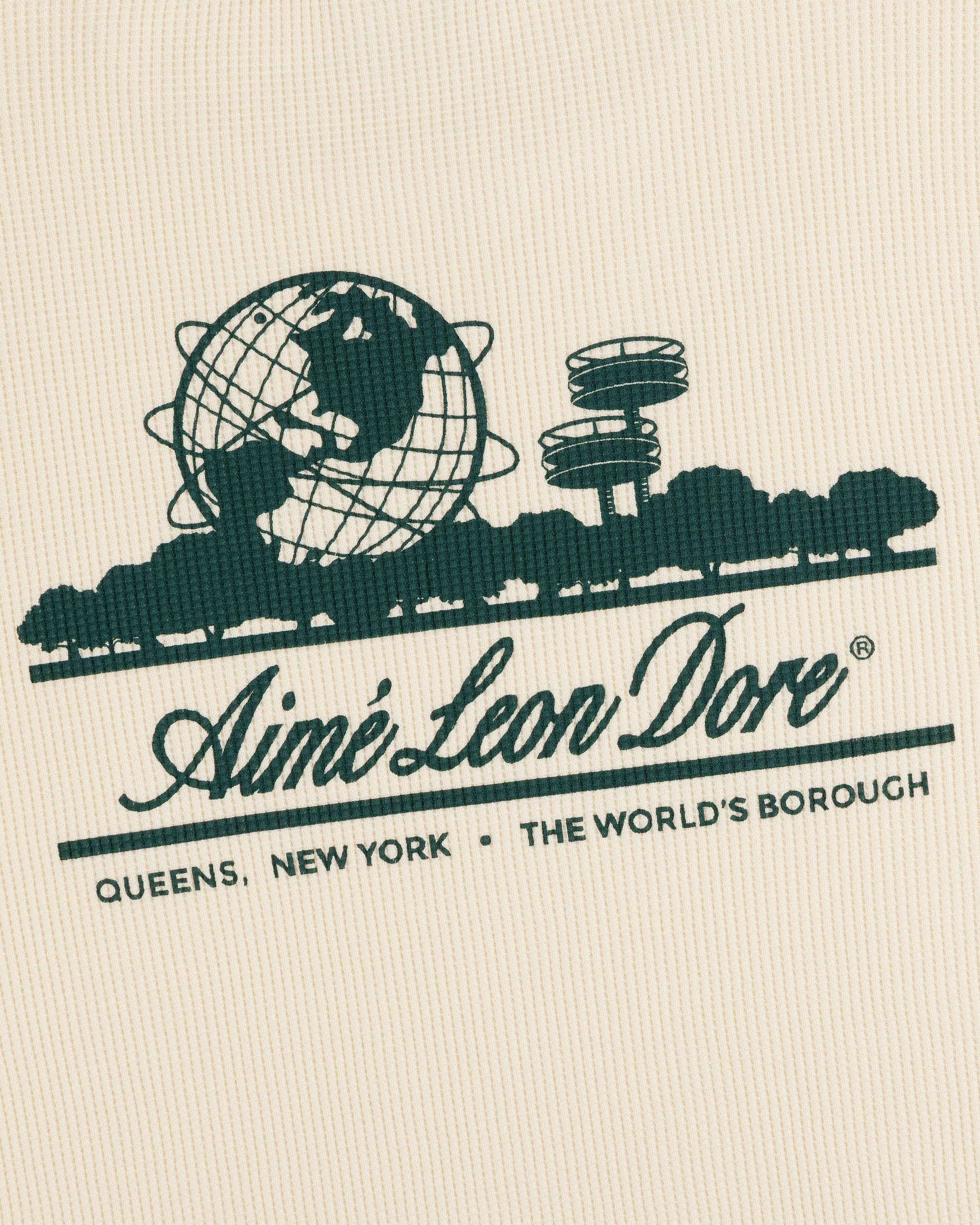 Cream Long-Sleeve Unisphere Waffle Thermal with green illustration and Aimé Leon Dore text featuring location info.