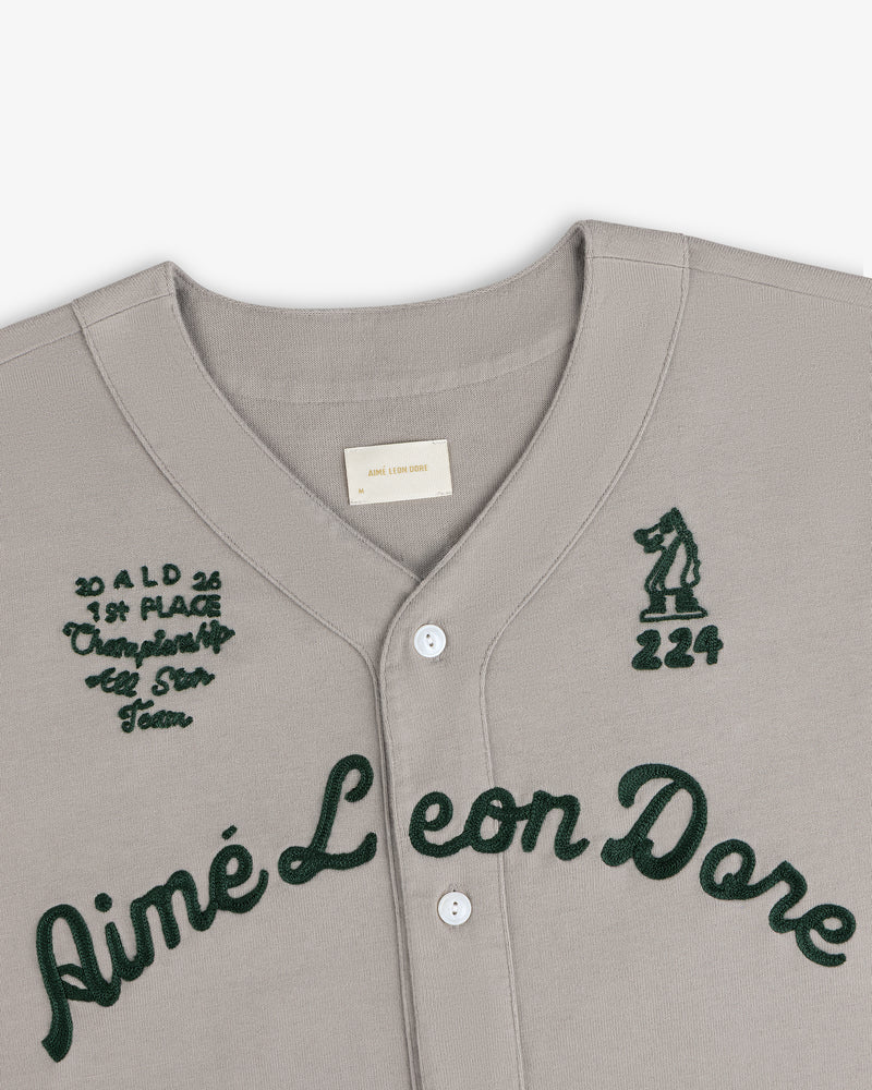 Mulberry Chainstitch Baseball Jersey with dark green embroidery, text, numbers, and a bear patch on the chest.