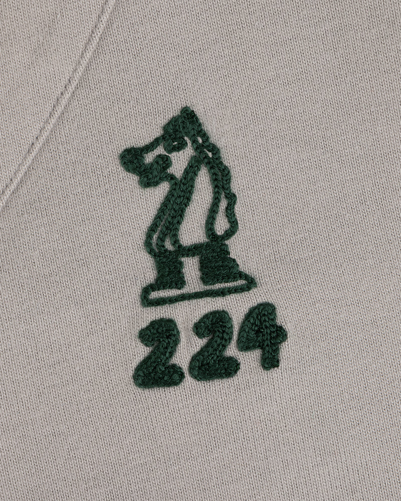 Mulberry Chainstitch Baseball Jersey with a green chess knight and 224 embroidered on light beige fabric.
