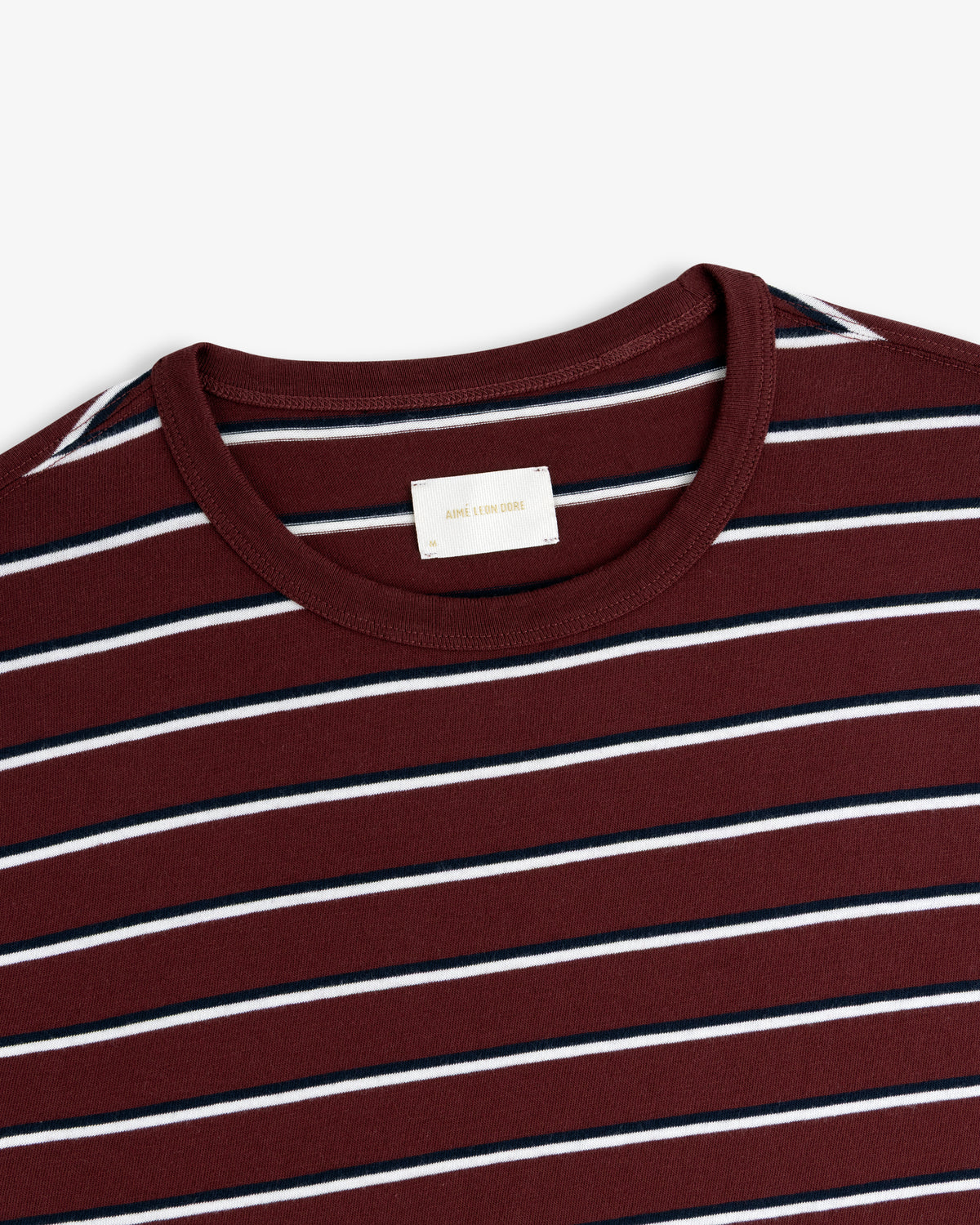 Yarn Dyed Striped Tee in maroon with white and navy stripes, displayed from the neck/shoulders on white.
