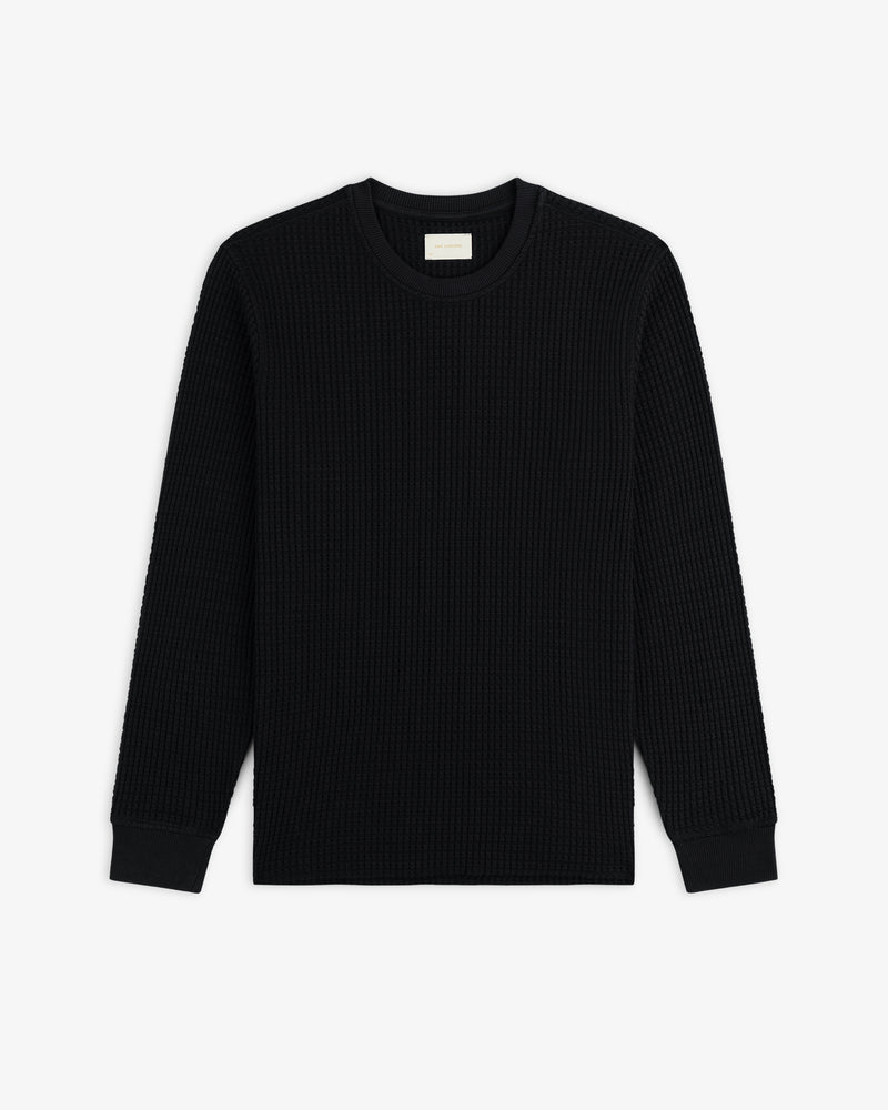 Black Long-Sleeve Waffle Thermal crewneck shirt with a waffle-knit texture.
