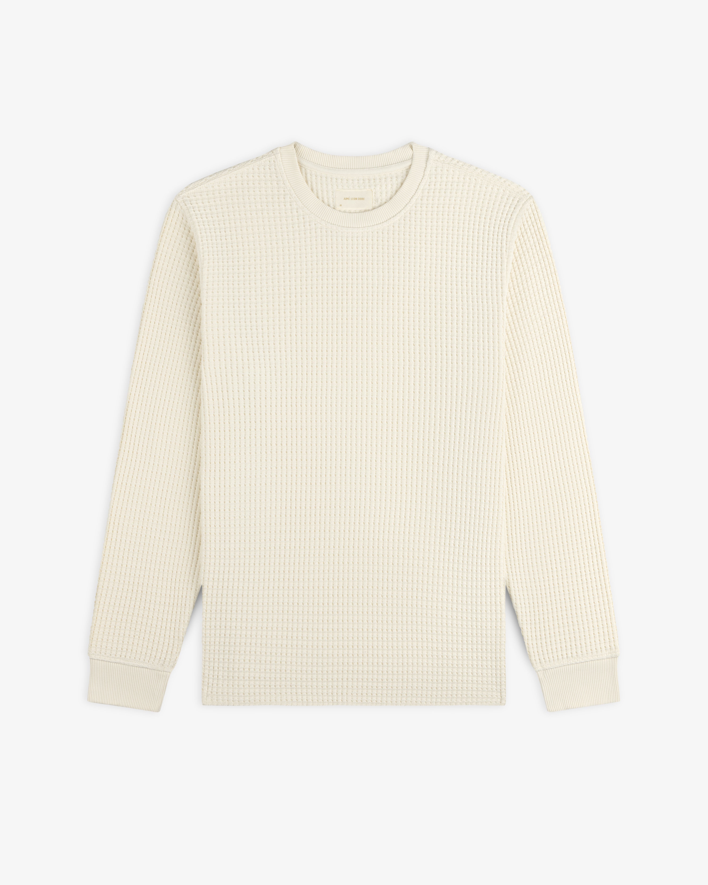 Off-white long-sleeve Long-Sleeve Waffle Thermal crewneck shirt with a waffle-knit texture.