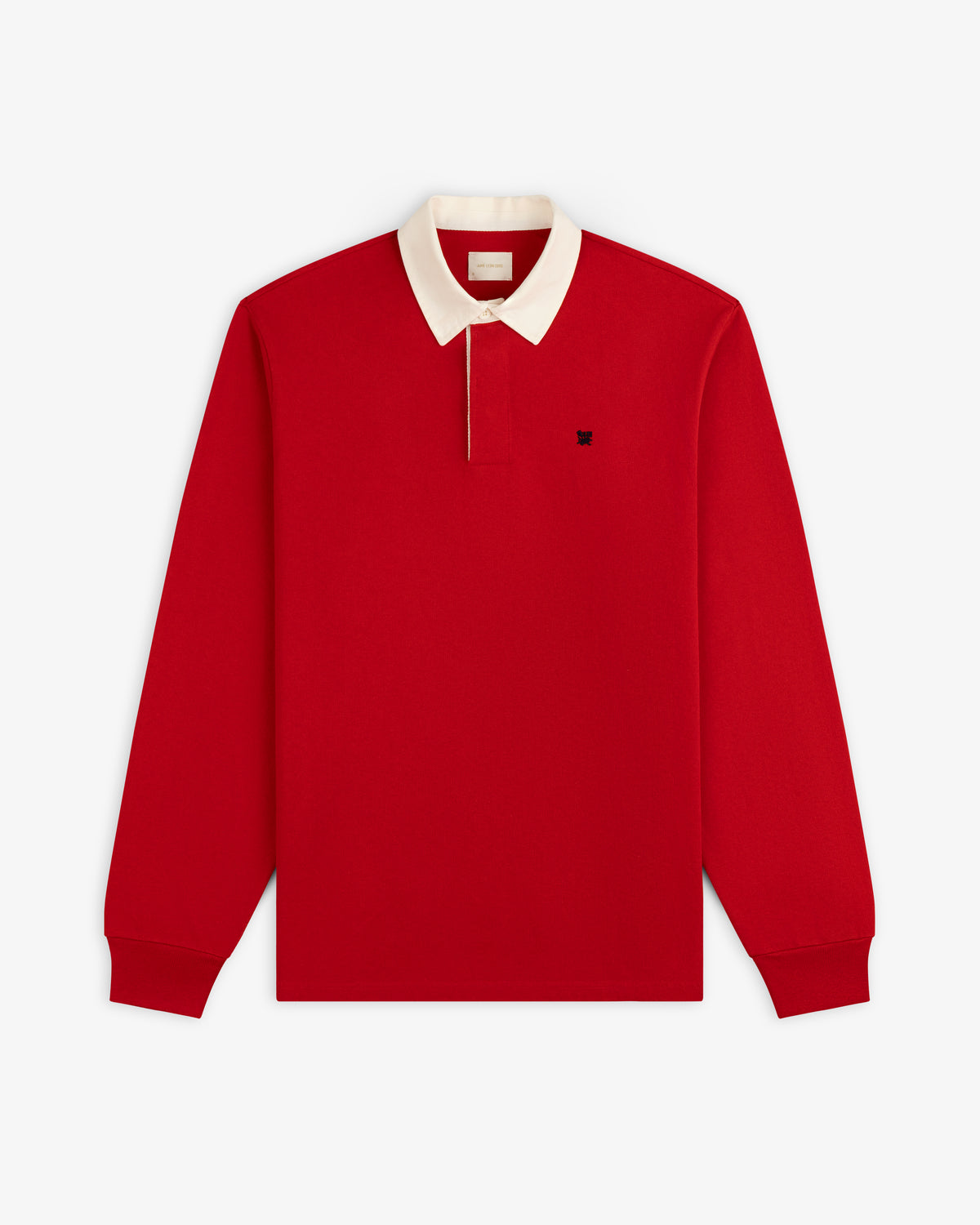 Crest Rugby: Red long-sleeve polo with white collar, front button, and small dark left-chest logo.