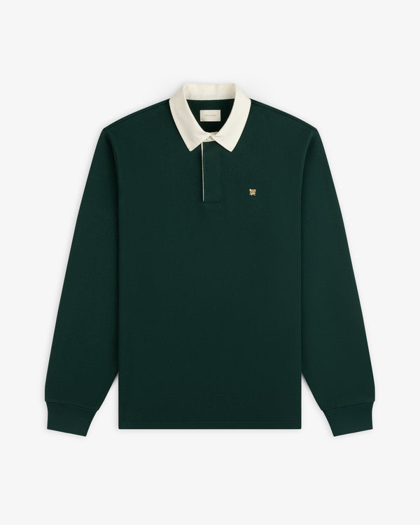 Crest Rugby: Dark green long-sleeve polo with white collar and small chest logo.