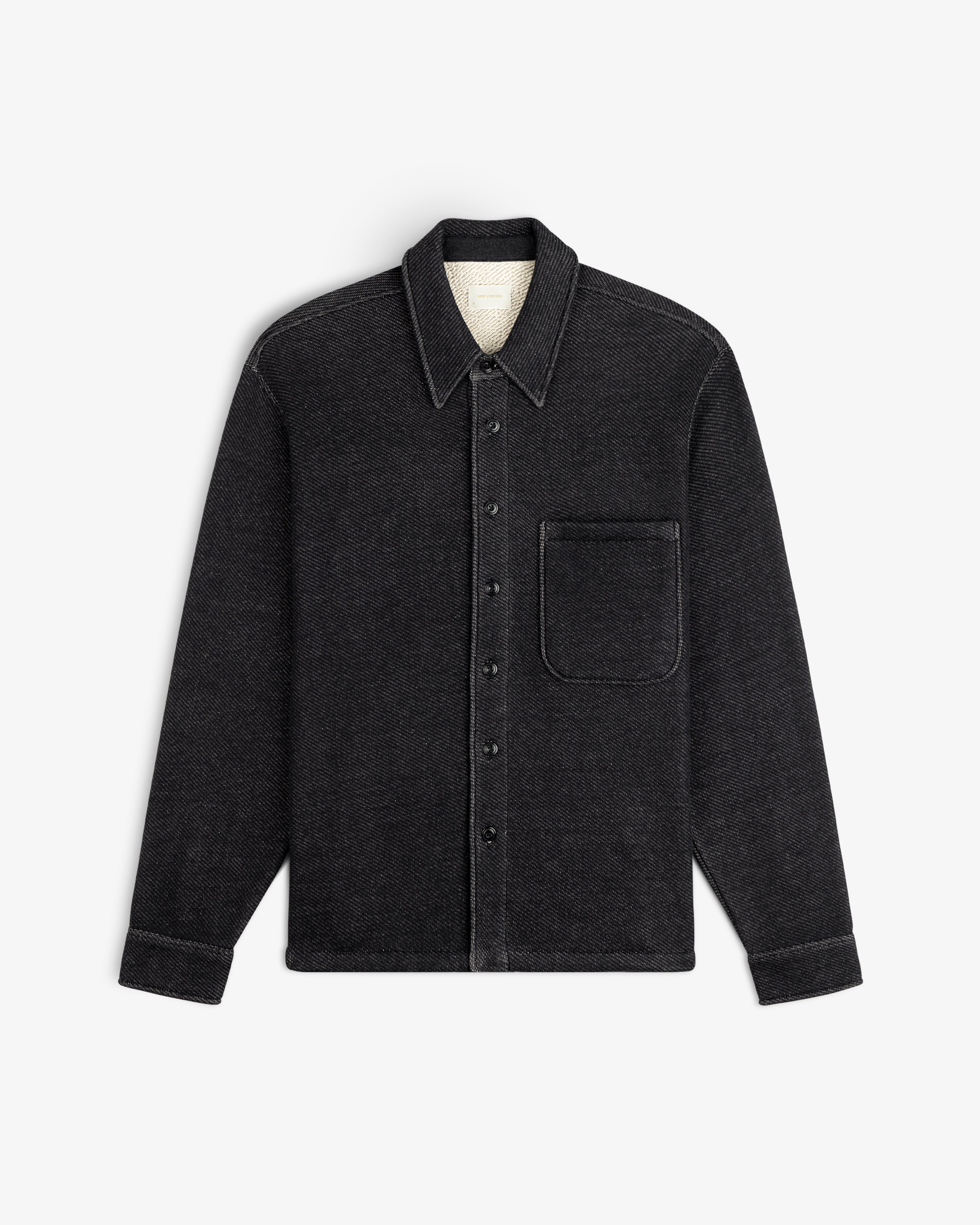 Terry Lounge Shirt: a black long-sleeve button-down with a collar, buttoned cuffs, and a single chest pocket.