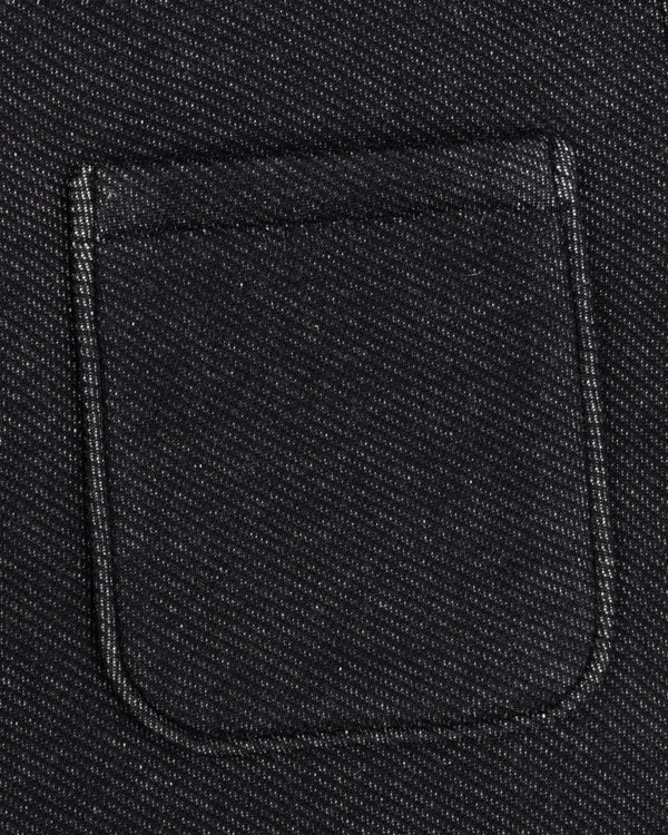 Close-up of a black textured Terry Lounge Shirt featuring a single chest pocket.