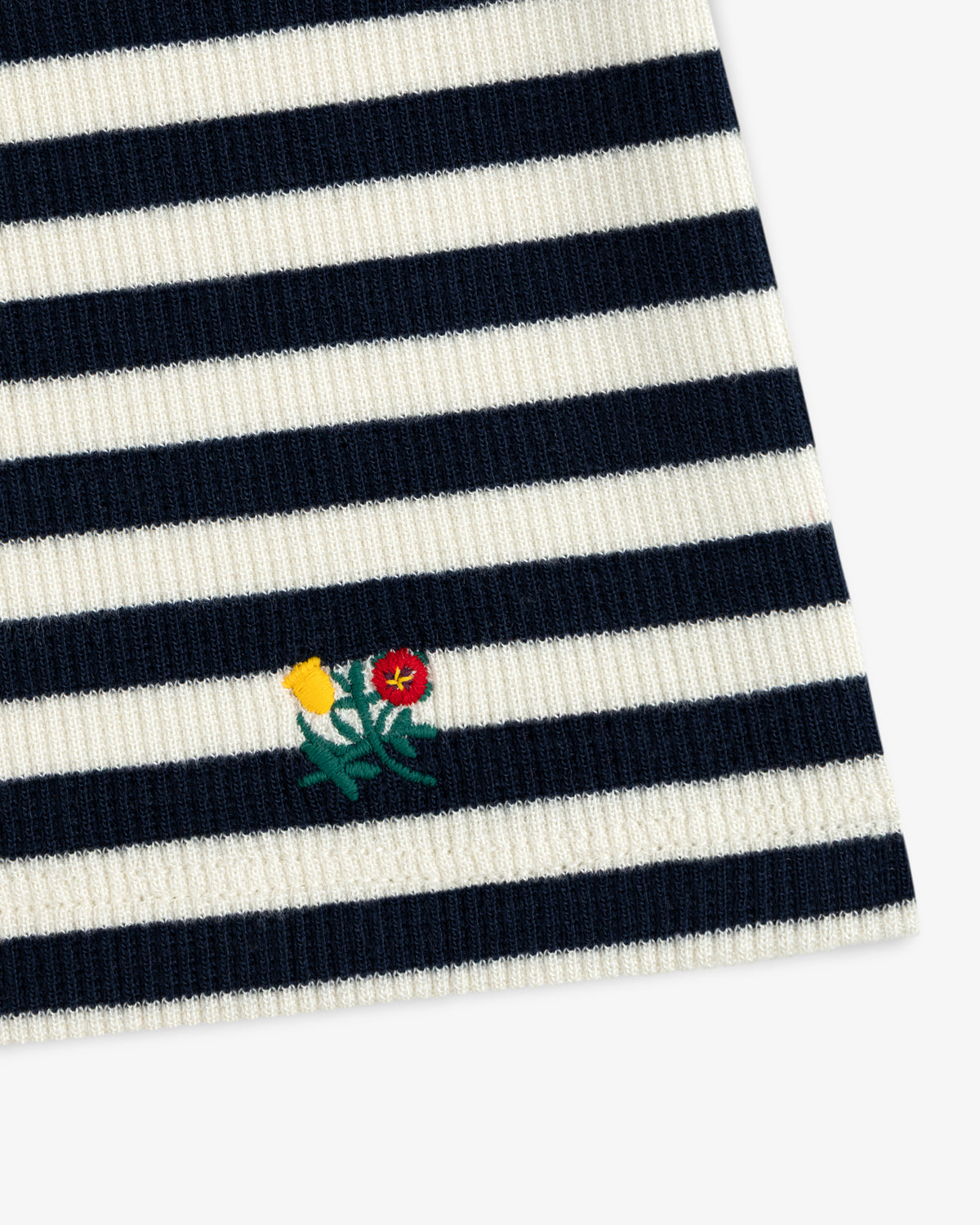 Ribbed Scoop Neck Long-Sleeve Tee in navy and white horizontal stripes with a small embroidered flower detail.