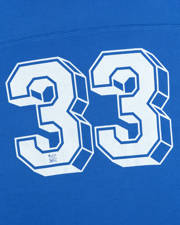 Football Ringer Tee featuring blue fabric with 3D-effect white block-style numbers 33.