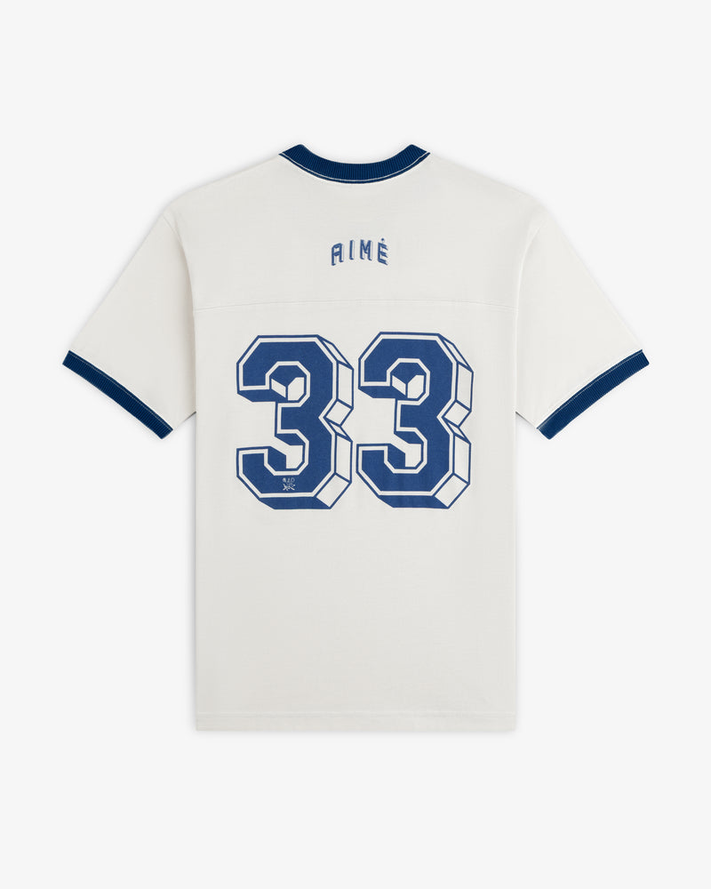 Off-white short-sleeved Football Ringer Tee with blue trim and the number 33 printed in blue on the back.