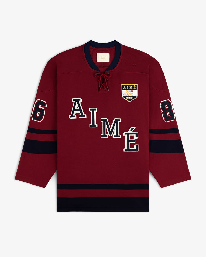 Team Aimé Hockey Jersey: maroon with navy stripes, AIME lettering, number 8 on the sleeves, and a chest patch.