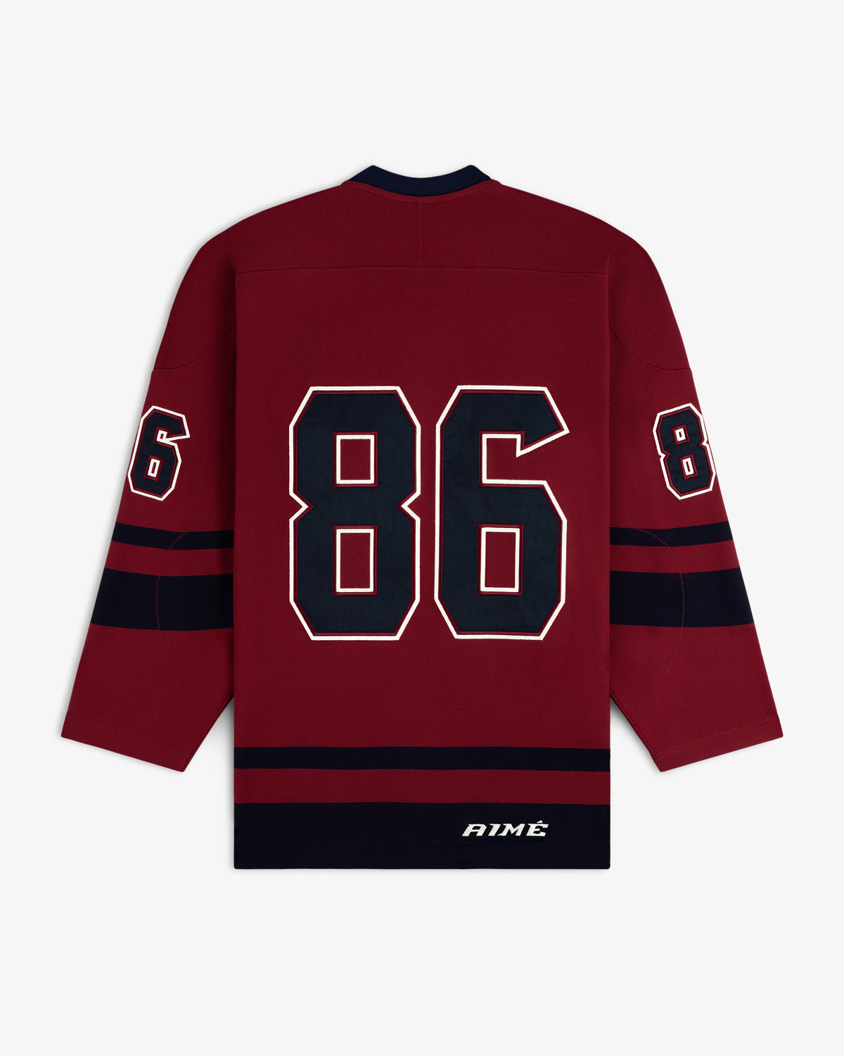 Back of a maroon Team Aimé Hockey Jersey with navy and white details, featuring the number 86 on the back and sleeves.