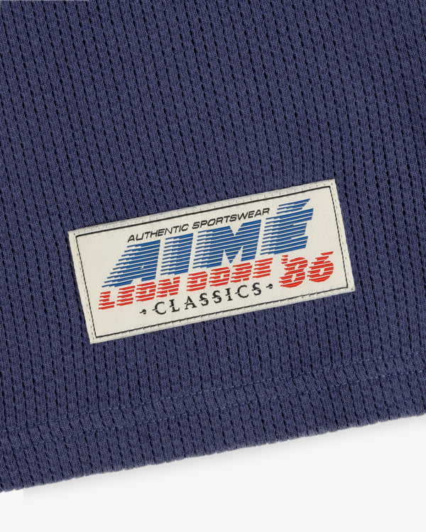 Blue ribbed Long-Sleeve Mesh Football Tee with “AUTHENTIC SPORTSWEAR AMR LION BOSS 86 CLASSICS” patch.