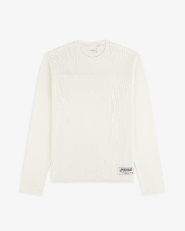 White Long-Sleeve Mesh Football Tee with a small patch near the hem, displayed on a plain background.