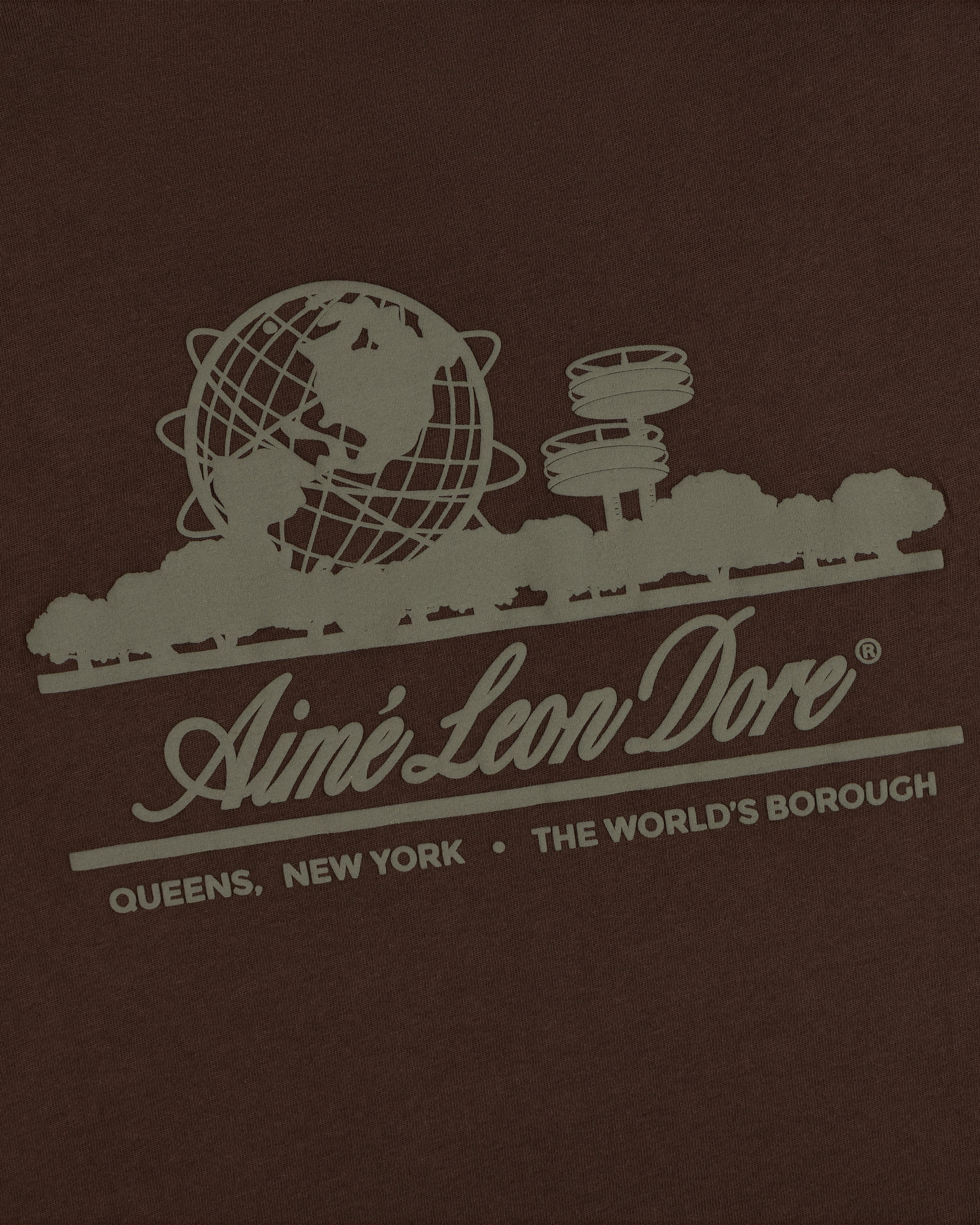 Unisphere Tee: globe, trees, and Aimé Leon Dore text—Queens, NY, The Worlds Borough on a dark background.