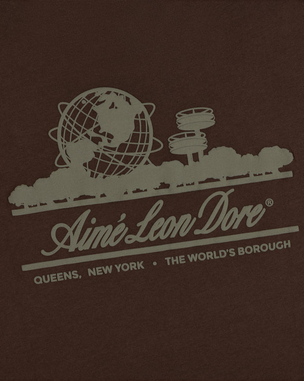 Unisphere Tee: globe, trees, and Aimé Leon Dore text—Queens, NY, The Worlds Borough on a dark background.