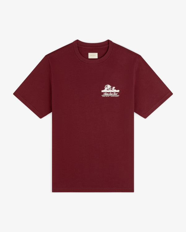 Unisphere Tee in burgundy with a small white graphic and text on the left chest, shown on a white background.