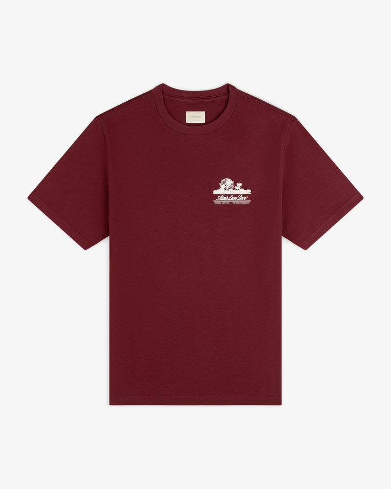 Unisphere Tee in burgundy with a small white graphic and text on the left chest, shown on a white background.