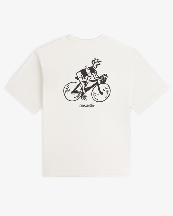 Aimé Tour Graphic Tee: White shirt with black cycling character graphic and stylized text underneath.