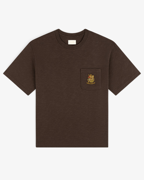 Saint George Slub Pocket Tee—brown short-sleeve with chest pocket and colorful embroidered crest.