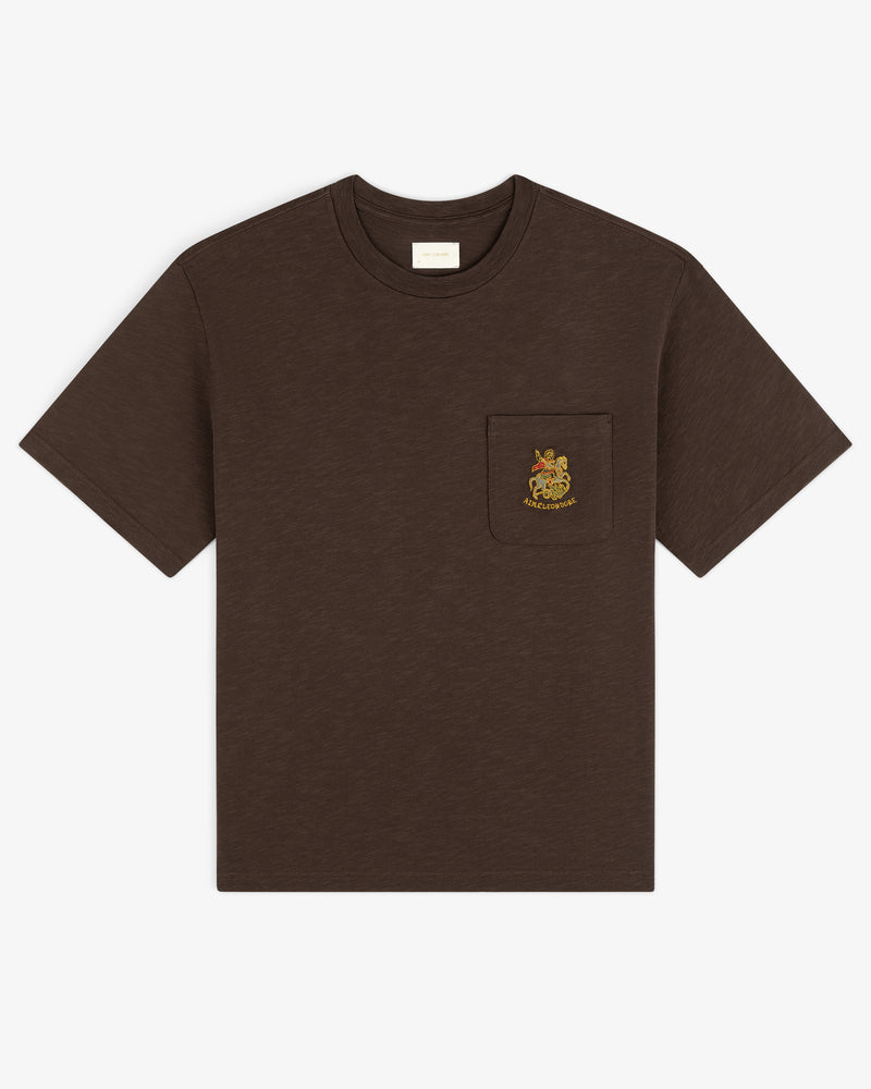 Saint George Slub Pocket Tee—brown short-sleeve with chest pocket and colorful embroidered crest.